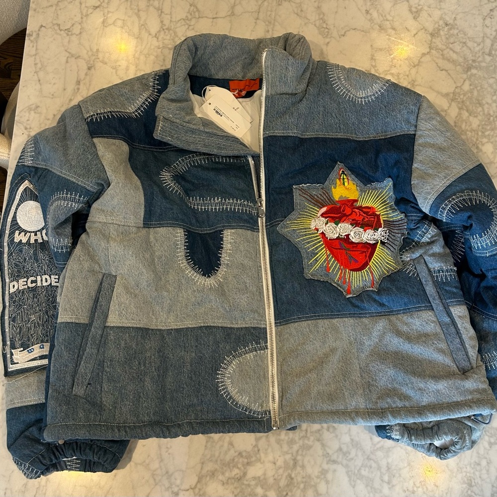 Who Decides War by MRDR BRVDO Blue Sacred Melded Denim Puffer Jacket